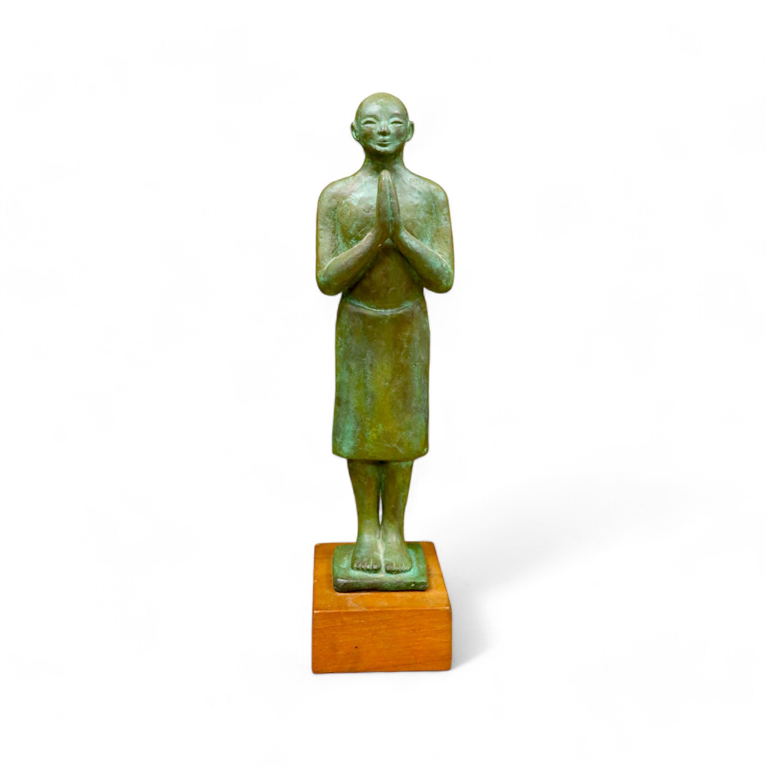 A figural bronze of an Oriental gentleman in prayer, height 42cm including stand. Condition - good